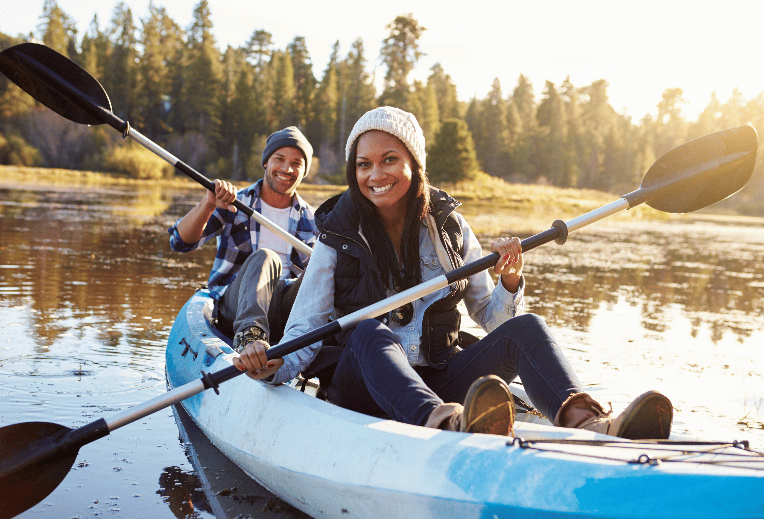 Two people kayaking on the lake